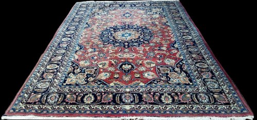 Lot 1093 - A Mashad carpet, the central rosette...