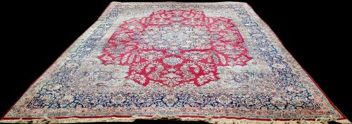 Lot 1099 - A Kirman carpet, the central rosette medallion...