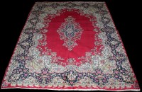 Lot 1101 - A Kirman carpet, the central foliate medallion...