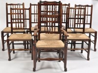 Lot 1143 - A set of eight 19th Century elm spindle back...