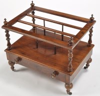 Lot 1146 - A Victorian walnut canterbury, the turned...