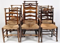 Lot 1154 - A set on eight 19th Century elm chairs,...