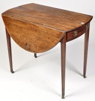 Lot 1156 - A George III mahogany Pembroke table, the oval...