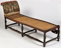Lot 1157 - A late 17th Century carved walnut day bed,...