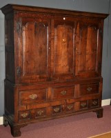 Lot 1169 - An 18th Century oak cupboard, the flared...