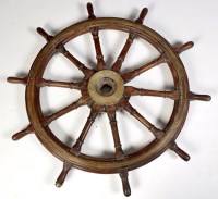 Lot 1218 - A large 19th Century brass mounted ships wheel,...