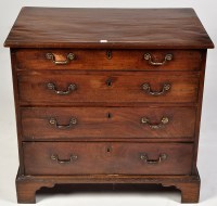 Lot 1219 - A George III mahogany chest of four long...