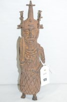 Lot 123 - A Benin bronze figure of a guardian with sword,...