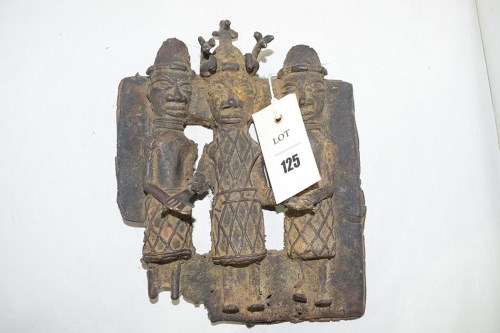 Lot 125 - A Benin bronze group of three figures, one...