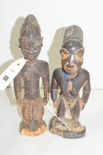Lot 130 - Yoruba Ibeji carved wooden figures, one female;...