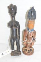 Lot 132 - A Yoruba Ibeji carved wooden female figure;...