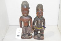 Lot 134 - Yoruba Ibeji carved wooden male and female...