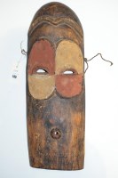 Lot 145 - A Central African elongated tribal mask,...