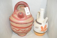 Lot 149 - African pottery jugs with hand-painted...