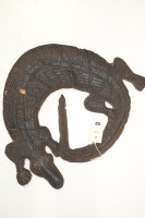 Lot 153 - An African tribal carved wooden crocodile.