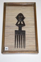 Lot 155 - A large African tribal comb depicting a female...