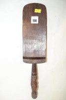 Lot 158 - An African tribal carved wooden scoop, the...