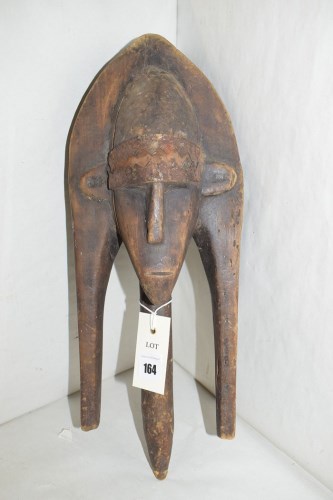 Lot 164 - A West African Bamana Merekun Janus puppet,...