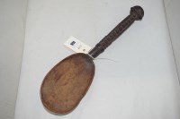 Lot 168 - A West African carved wooden spoon, 36cms.