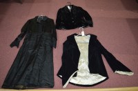 Lot 200 - An early 20th Century black silk dress with...