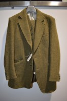 Lot 207 - A gentleman's Harris Tweed green woolen...