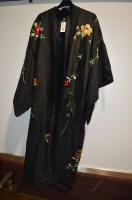 Lot 212 - A 20th Century black silk effect embroidered...