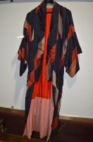 Lot 214 - A 20th Century silk kimono with variegated red...