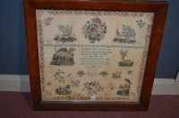 Lot 230 - A Victorian woolwork sampler with verse,...