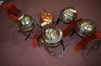 Lot 268 - Reproduction helmets: four brass and steel...