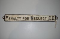 Lot 418 - A railway cast iron 'Penalty for Neglect £2''...