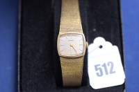 Lot 512 - A 9ct. yellow gold lady's wristwatch by...
