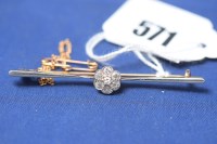 Lot 571 - A diamond bar brooch, the seven old cut...