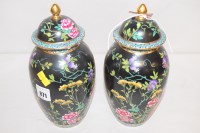 Lot 871 - A pair of Maling lidded vases, decorated with...
