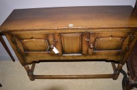 Lot 1293 - An 18th Century style oak side cabinet by...