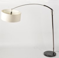 Lot 908 - A contemporary arc style floor lamp, in a...