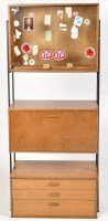 Lot 913 - An Avalon ladderex style teak wall unit with...