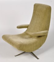 Lot 936 - Fama: a modern lounge armchair, upholstered in...