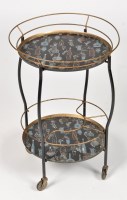 Lot 949 - A vintage 1950's two-tier drinks trolley, by...