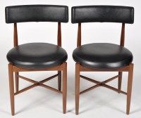 Lot 977 - G-Plan: a pair of teak and black leatherette...
