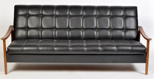 Lot 992 - A 1960's black faux leather day bed, with...