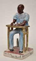 Lot 1046 - Mario Lissette: a ceramic figure of a man...
