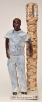 Lot 1047 - Mario Lissette: a ceramic figure of a man...