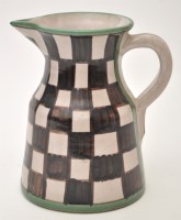 Lot 1060 - A ceramic jug decorated with brown checked...
