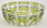 Lot 1091 - A clear and green overlay cut glass bowl,...
