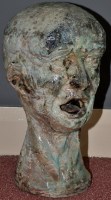 Lot 1107 - Attributed to Mario Lissette - head of a man,...