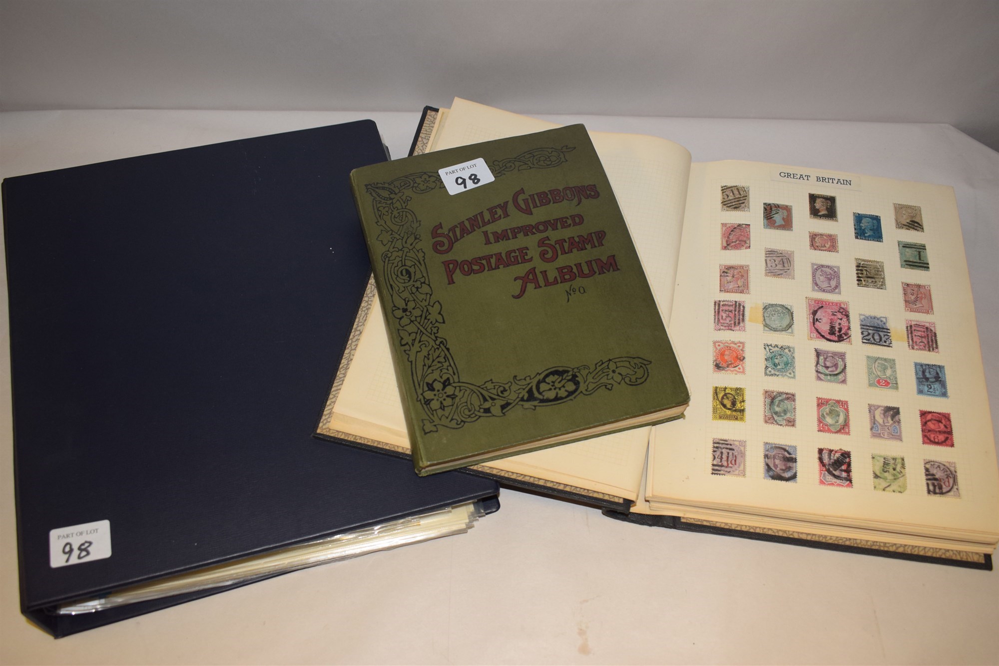 Lot 98 Stanley Gibbons improved postage stamp album