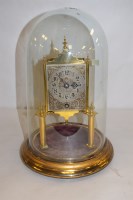 Lot 451 - A brass skeleton clock, with engraved arabic...