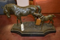 Lot 474 - A patinated bronze mare and foal group, on...