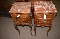 Lot 644 - Two French carved walnut pedestal cabinets,...