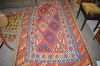 Lot 685 - A first half 20th Century Kilim runner, with...